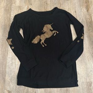 Girls Size 12 black light sweater with gold unicorn and star detail.